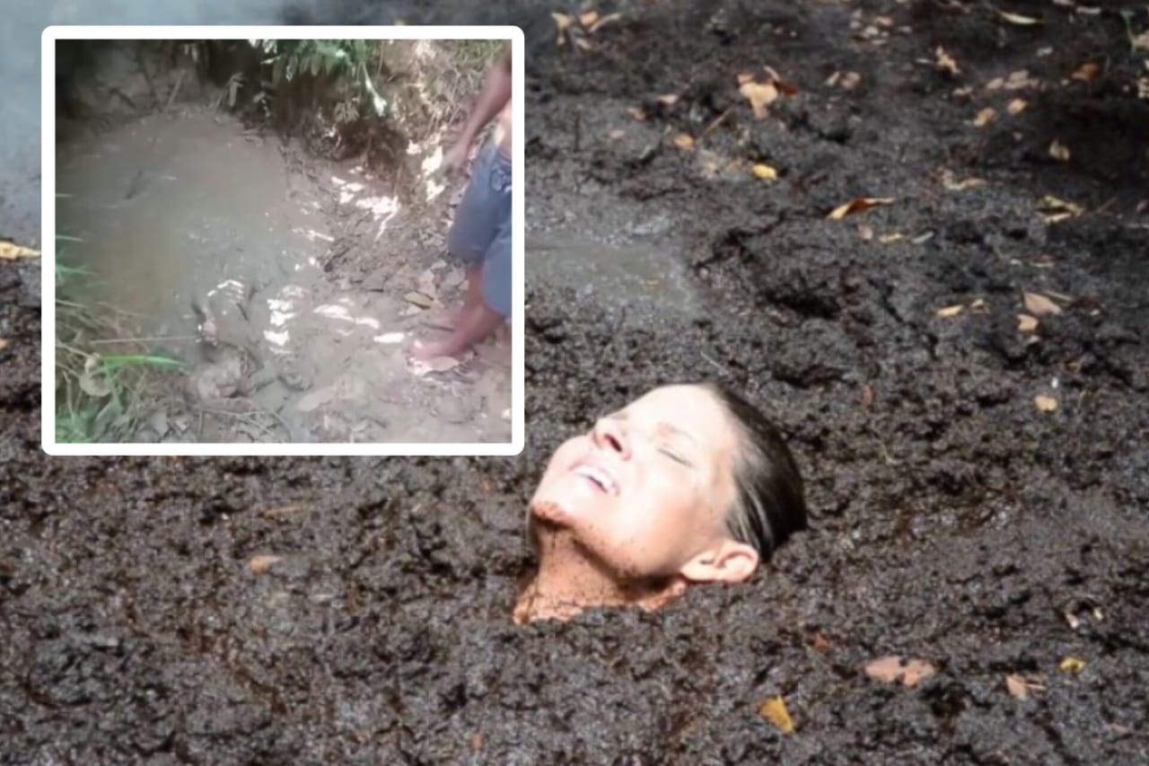 seorang ibu terkubur di lumpur